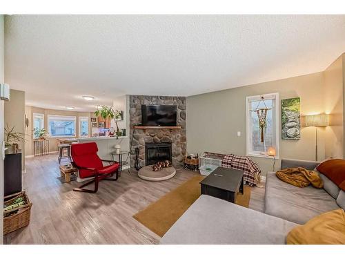 960 Wilson Way, Canmore, AB - Indoor Photo Showing Living Room With Fireplace