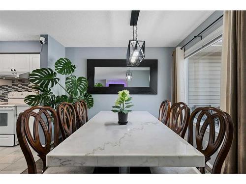 214 Evansmeade Point Nw, Calgary, AB - Indoor Photo Showing Dining Room