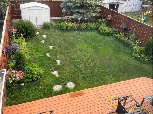 214 Evansmeade Point Nw, Calgary, AB - Outdoor With Deck Patio Veranda