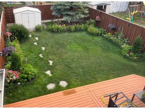 214 Evansmeade Point Nw, Calgary, AB - Outdoor With Deck Patio Veranda