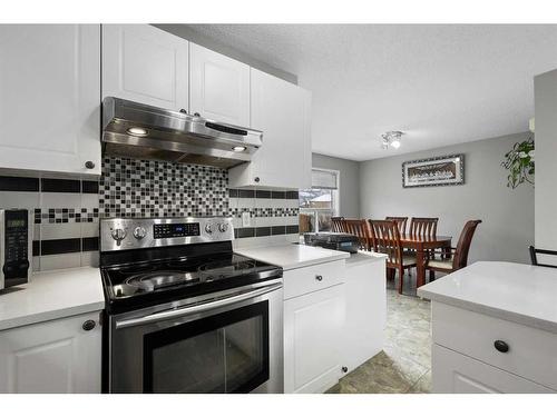 75 Bridlewood Avenue Sw, Calgary, AB - Indoor Photo Showing Kitchen