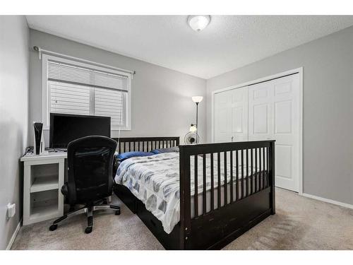 75 Bridlewood Avenue Sw, Calgary, AB - Indoor Photo Showing Bedroom