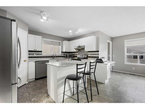 75 Bridlewood Avenue Sw, Calgary, AB - Indoor Photo Showing Kitchen With Stainless Steel Kitchen