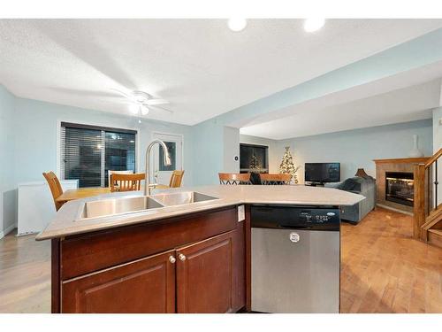 153 Somerset Way Sw, Calgary, AB - Indoor Photo Showing Kitchen With Double Sink