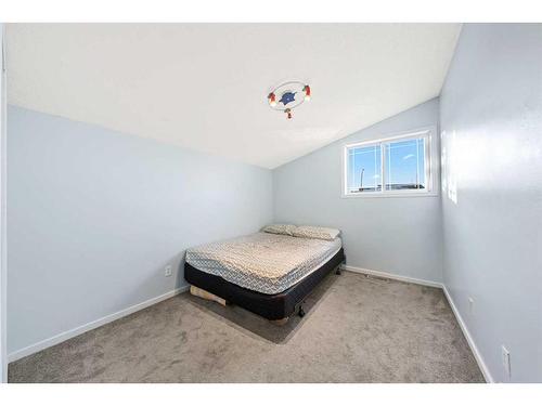 153 Somerset Way Sw, Calgary, AB - Indoor Photo Showing Bedroom