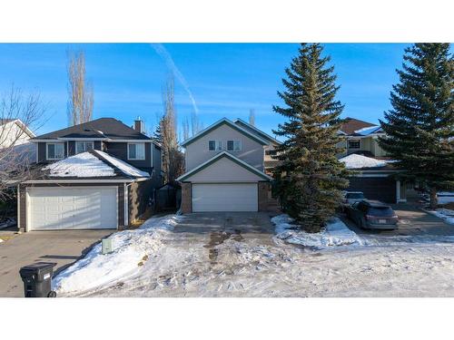 153 Somerset Way Sw, Calgary, AB - Outdoor With Facade