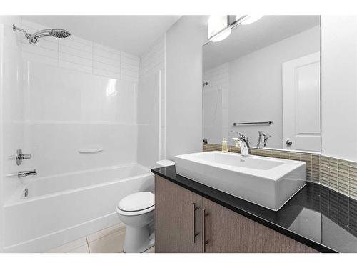 52 West Coach Manor Sw, Calgary, AB - Indoor Photo Showing Bathroom