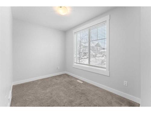 52 West Coach Manor Sw, Calgary, AB - Indoor Photo Showing Other Room