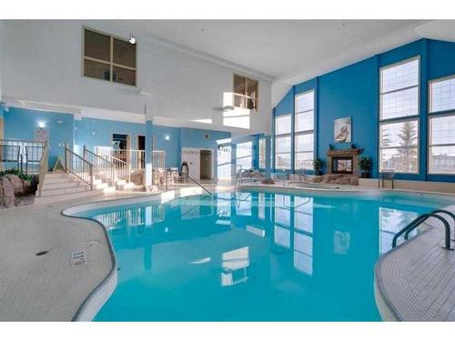 2253-151 Country Village Road Ne, Calgary, AB - Indoor Photo Showing Other Room With In Ground Pool