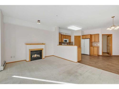 2253-151 Country Village Road Ne, Calgary, AB - Indoor With Fireplace