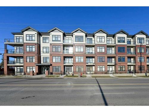 305-1702 17 Avenue Sw, Calgary, AB - Outdoor With Balcony With Facade