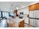 305-1702 17 Avenue Sw, Calgary, AB  - Indoor Photo Showing Kitchen With Double Sink With Upgraded Kitchen 