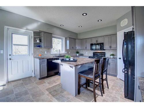 283211 Township Road 284, Rural Rocky View County, AB - Indoor Photo Showing Kitchen With Upgraded Kitchen