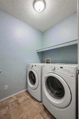 78 Evansmeade Circle Nw, Calgary, AB - Indoor Photo Showing Laundry Room