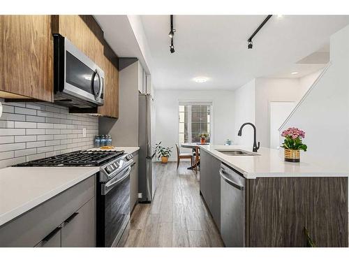 16 Walgrove Common Se, Calgary, AB - Indoor Photo Showing Kitchen With Stainless Steel Kitchen With Upgraded Kitchen