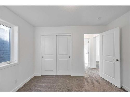 305 Baneberry Way Sw, Airdrie, AB - Indoor Photo Showing Other Room