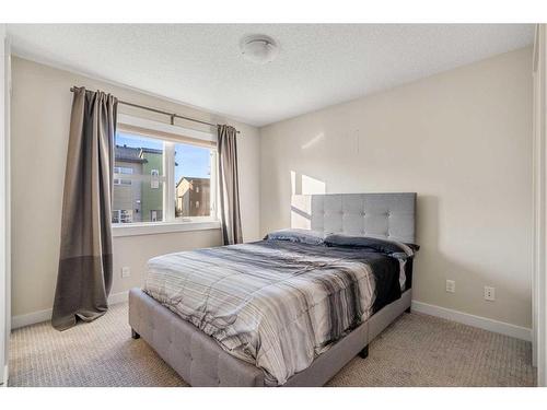 1602-2461 Baysprings Link Sw, Airdrie, AB - Indoor Photo Showing Bedroom