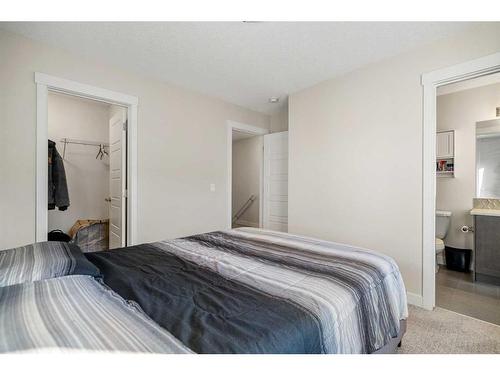 1602-2461 Baysprings Link Sw, Airdrie, AB - Indoor Photo Showing Bedroom