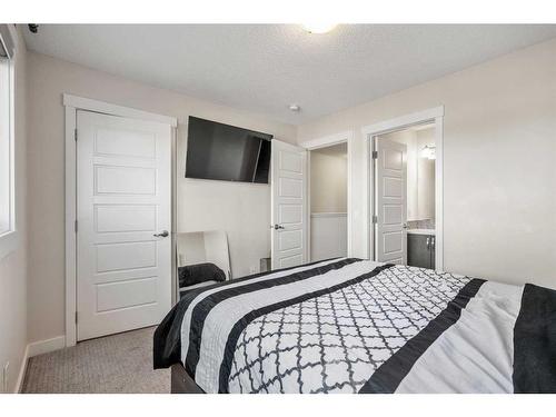 1602-2461 Baysprings Link Sw, Airdrie, AB - Indoor Photo Showing Bedroom