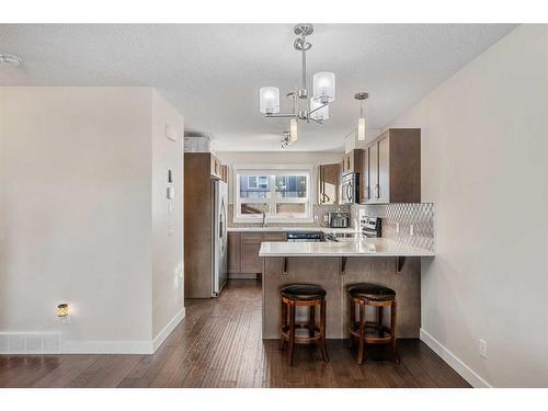 1602-2461 Baysprings Link Sw, Airdrie, AB - Indoor Photo Showing Kitchen