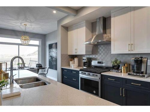 91 Sundown Crescent, Cochrane, AB - Indoor Photo Showing Kitchen With Double Sink With Upgraded Kitchen