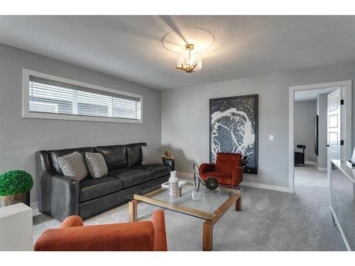 91 Sundown Crescent, Cochrane, AB - Indoor Photo Showing Living Room