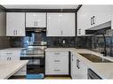 61-116 Silver Crest Drive Nw, Calgary, AB  - Indoor Photo Showing Kitchen With Double Sink 