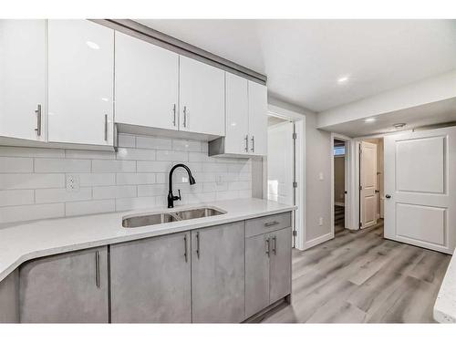 232 Manora Crescent Ne, Calgary, AB - Indoor Photo Showing Kitchen With Double Sink