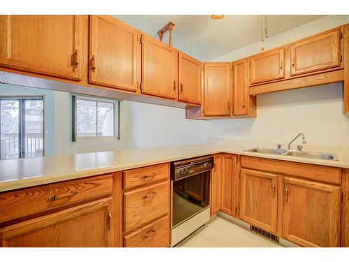 72 Sandarac Circle Nw, Calgary, AB - Indoor Photo Showing Kitchen With Double Sink