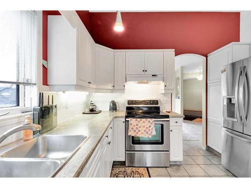 4 Sierra Vista Circle Sw, Calgary, AB - Indoor Photo Showing Kitchen With Double Sink