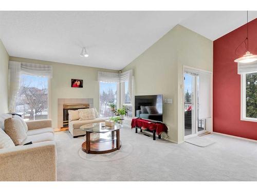 4 Sierra Vista Circle Sw, Calgary, AB - Indoor Photo Showing Living Room With Fireplace