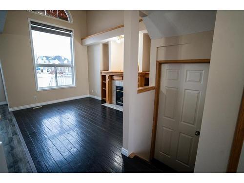 3 Saddlemont Close Ne, Calgary, AB - Indoor Photo Showing Other Room With Fireplace