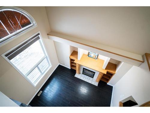 3 Saddlemont Close Ne, Calgary, AB - Indoor Photo Showing Other Room With Fireplace