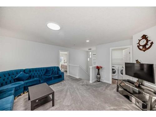 760 Corner Meadows Way Ne, Calgary, AB - Indoor Photo Showing Living Room