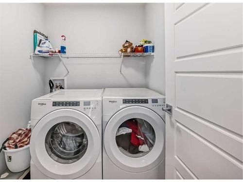 760 Corner Meadows Way Ne, Calgary, AB - Indoor Photo Showing Laundry Room