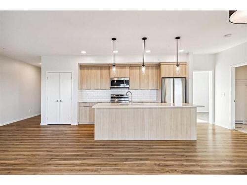 3307-220 Seton Grove Se, Calgary, AB - Indoor Photo Showing Kitchen With Upgraded Kitchen