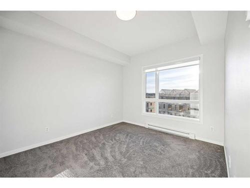 3307-220 Seton Grove Se, Calgary, AB - Indoor Photo Showing Other Room