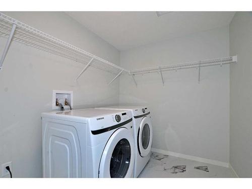 2206-220 Seton Grove Se, Calgary, AB - Indoor Photo Showing Laundry Room