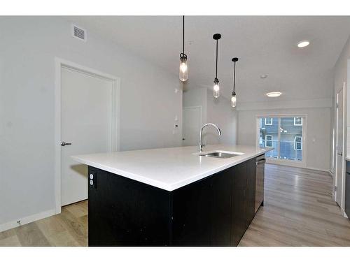 2206-220 Seton Grove Se, Calgary, AB - Indoor Photo Showing Kitchen