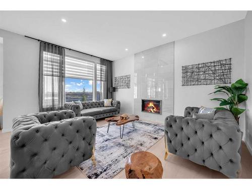 608 West Lakeview Drive, Chestermere, AB - Indoor Photo Showing Living Room With Fireplace