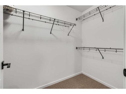 901 Windsong Drive Sw, Airdrie, AB - Indoor With Storage