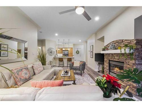 505-10 Discovery Ridge Close Sw, Calgary, AB - Indoor Photo Showing Living Room With Fireplace