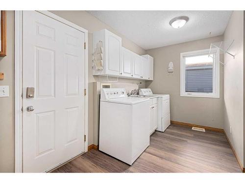 1721 Harrison Street, Crossfield, AB - Indoor Photo Showing Laundry Room