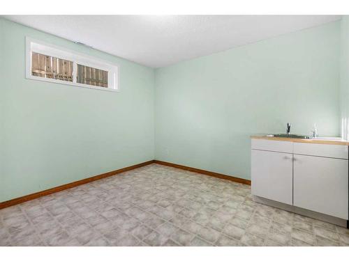 1721 Harrison Street, Crossfield, AB - Indoor Photo Showing Other Room