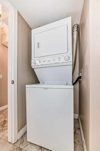 405-2000 Applevillage Court Se, Calgary, AB - Indoor Photo Showing Laundry Room