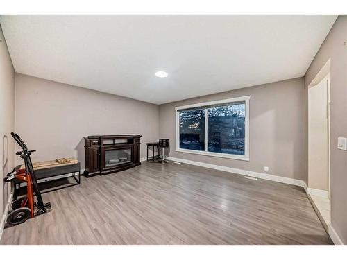 184 Castlebrook Drive Ne, Calgary, AB - Indoor Photo Showing Living Room With Fireplace