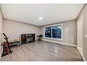 184 Castlebrook Drive Ne, Calgary, AB  - Indoor Photo Showing Living Room With Fireplace 