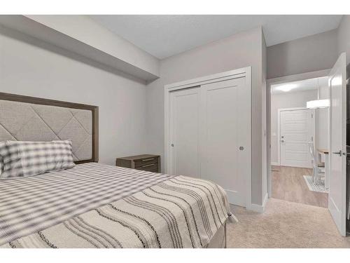 111-300 Auburn Meadows Manor Se, Calgary, AB - Indoor Photo Showing Bedroom