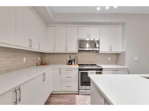 111-300 Auburn Meadows Manor Se, Calgary, AB - Indoor Photo Showing Kitchen