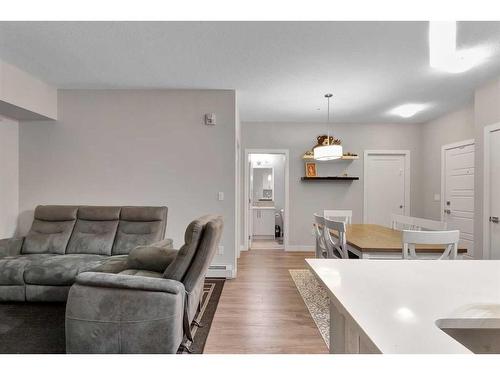 111-300 Auburn Meadows Manor Se, Calgary, AB - Indoor Photo Showing Living Room